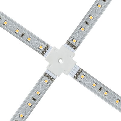Four-arm white LED strip connector for flexible 24V LED light strip installation and connection.