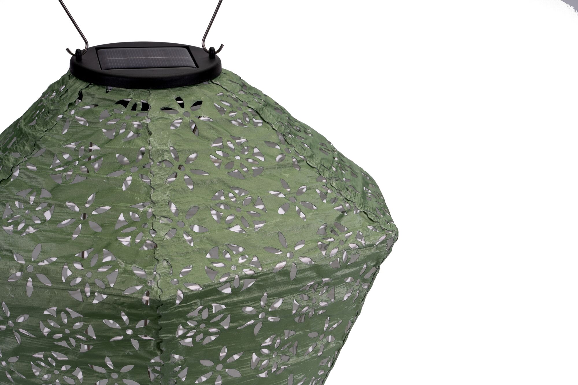 Green fabric solar lantern lampshade with floral cutouts for outdoor lighting and garden decoration