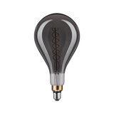 Large smoke glass light bulb with visible spiral filament and metal base for decorative lighting use