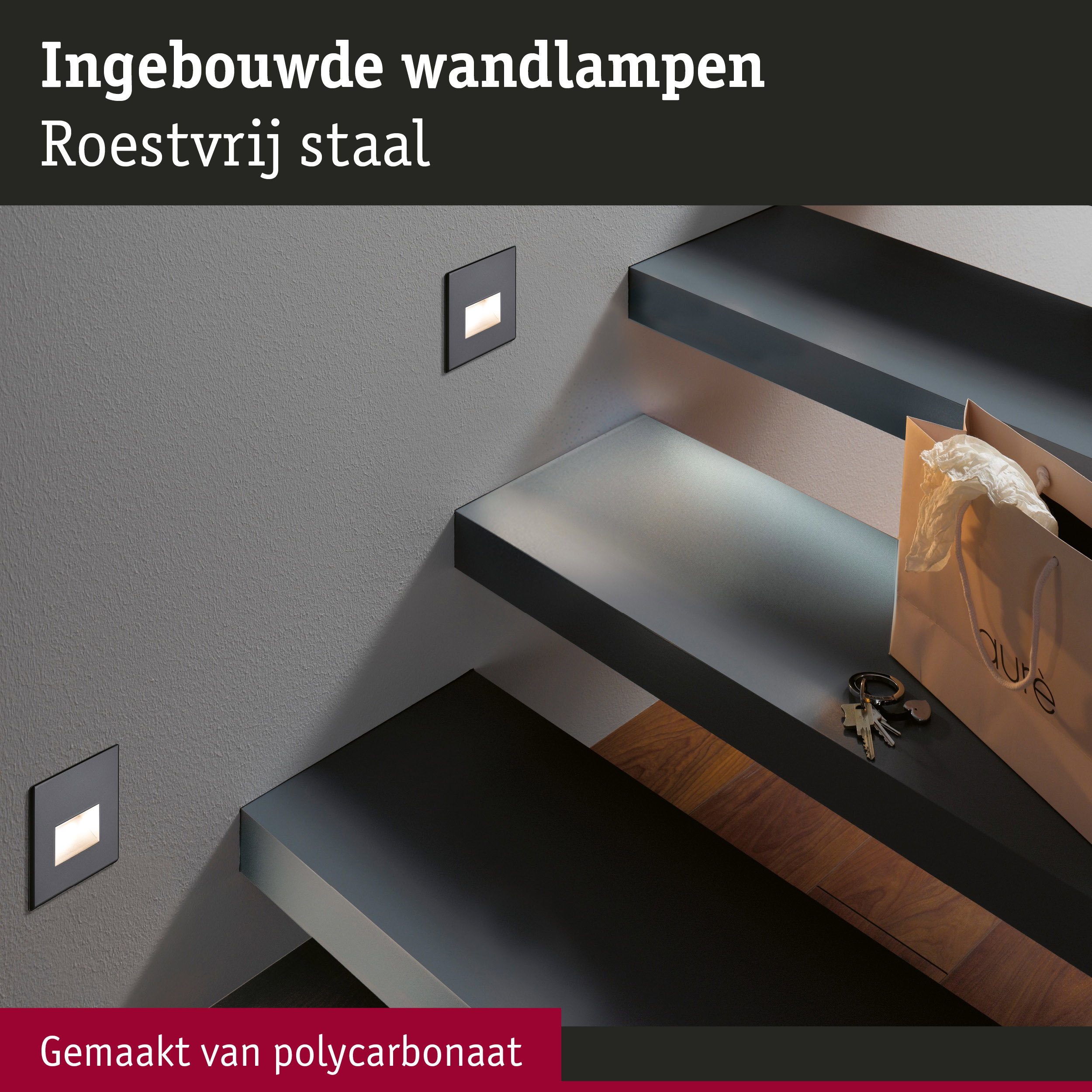 Ingebouwde wandlamp van roestvrij staal met zwarte rand aan grijze muur bij trap