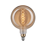 Large LED bulb with spiral filament in amber glass for decorative lighting and warm ambiance