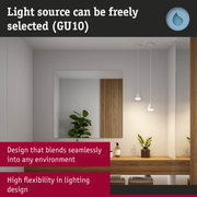 Modern bathroom with white pendant lights and wooden vanity for flexible lighting design