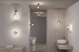 Modern transparent glass wall and ceiling lights with warm illumination in a minimalist bathroom.