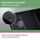 Black Plug & Shine solar panel with timer function for time-controlled outdoor lighting