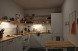Modern kitchen with white cabinets, wooden countertops, and warm white LED under-cabinet lighting for workspace illumination.