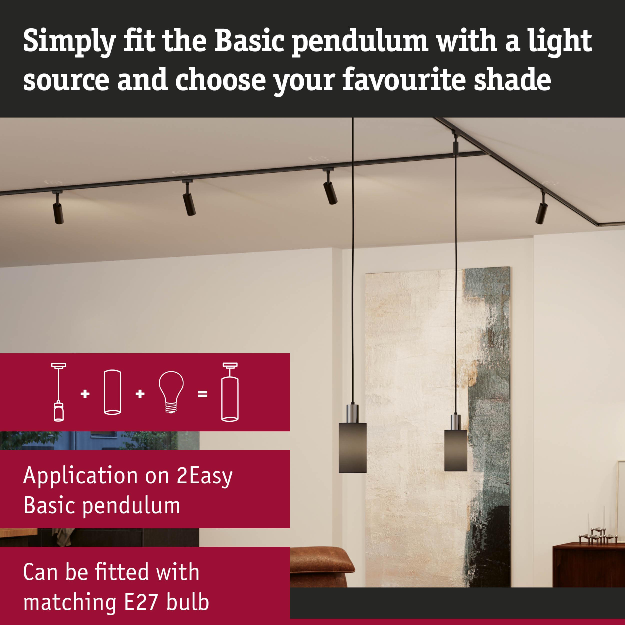 Two black Basic Pendulum pendant lights with metal and glass in modern living room with artwork