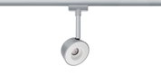 Moderner silberner LED-Strahler aus Metall an Schienensystem für flexible Raumbeleuchtung
