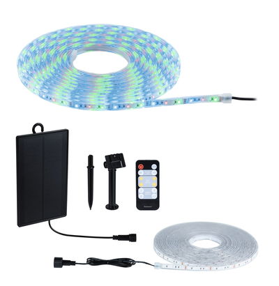 LED strip light with solar panel, remote control, and accessories for flexible outdoor lighting in white and RGB.