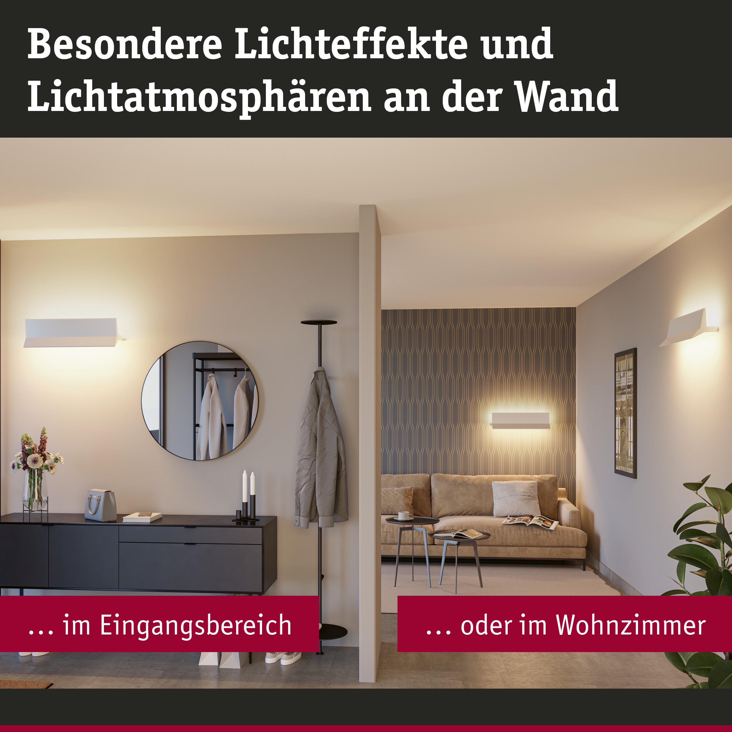 Moderne weiße Wandleuchten erzeugen besondere Lichteffekte im Eingangsbereich und Wohnzimmer.