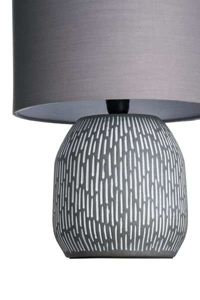 Gray ceramic table lamp base with white pattern and gray fabric shade for home lighting