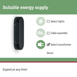 Black elongated energy supply housing with ventilation slots, lighting accessories component