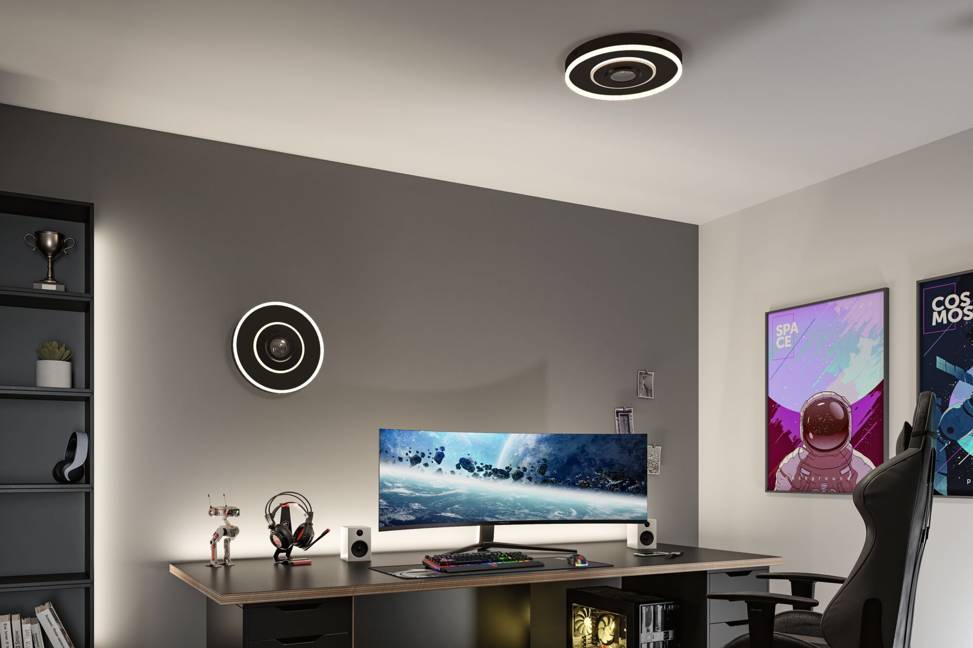 Modern office with black circular LED ceiling light emitting warm white light above gaming desk setup
