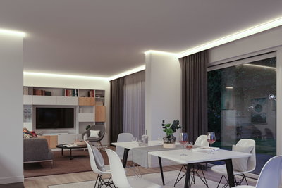 Modern living room with warm white indirect LED ceiling lighting, minimalist design featuring white furniture.