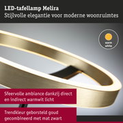 LED-tafellamp Melira in geborsteld goud met matzwarte accenten en warm wit licht