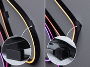 Black LED wall mounts with yellow, orange, and purple neon light for modern wall decoration and lighting.
