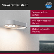 Grey outdoor wall light with seawater resistant surface and LED illumination for coastal areas