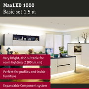 Modern white kitchen featuring MaxLED 1000 lighting system with under-cabinet LED illumination