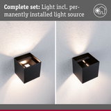 Black metal wall light with built-in LED source for modern indoor lighting solutions