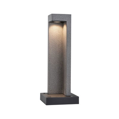 Modern grey concrete outdoor wall light with integrated LED for garden lighting