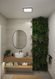 Salle de bain moderne avec plafonnier carré, meuble en bois et mur végétal vert.
