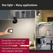 Black LED light with magnetic ball head, convertible for table, wall, or clamp lighting use