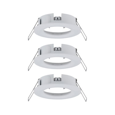 Three white plastic recessed frames with metal springs for LED ceiling lights installation.