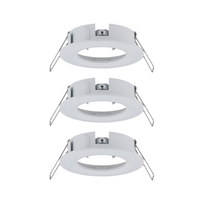 Trois cadres encastrés blancs en plastique avec ressorts métalliques pour lampes LED au plafond.