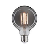 Round LED bulb with clear glass and visible filaments, energy-saving light source