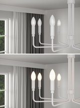 Modern white ceiling chandelier with four candle-shaped LED lights in living room with curtains.
