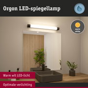 Orgon LED-spiegellamp met warm wit licht boven grijze wastafel in moderne badkamer