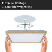 Montageanleitung für eine Deckenleuchte mit Holzrahmen und einfachem Drehverschluss zur Befestigung