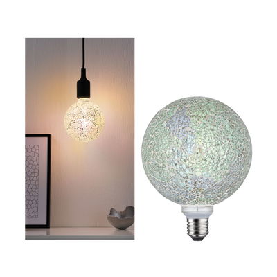 Mosaic glass globe bulb emitting warm white light, decorative LED lighting for cozy ambiance.