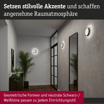 Moderner Flur mit geometrischen LED-Wandleuchten in Schwarz-Weiß für stilvolle Raumakzente