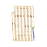 Flexible LED strip light with warm white glow and connector cable for versatile lighting applications