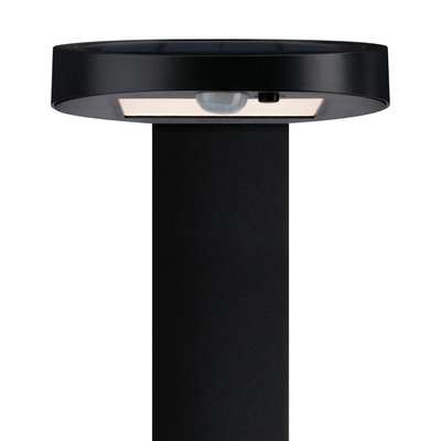 Black metal solar light with motion sensor and LED for outdoor use and garden lighting