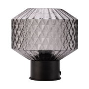 Modern table lamp with smoky faceted glass and black metal base for stylish lighting decor