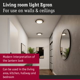 Round Egon ceiling light in black and white for living room, hallway, and kitchen with modern lantern style