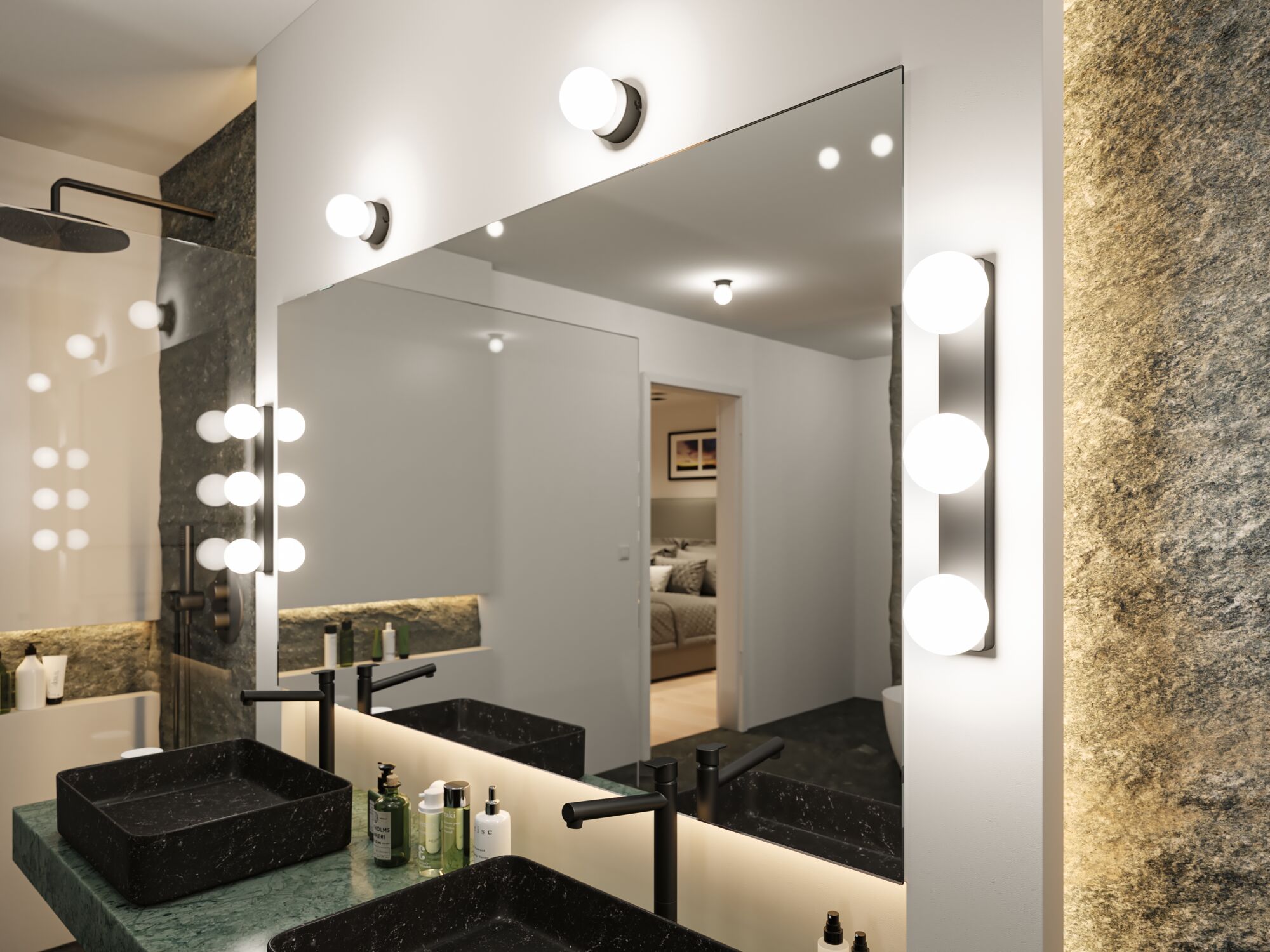 Modern bathroom with black marble sink and warm white wall lights for stylish lighting design