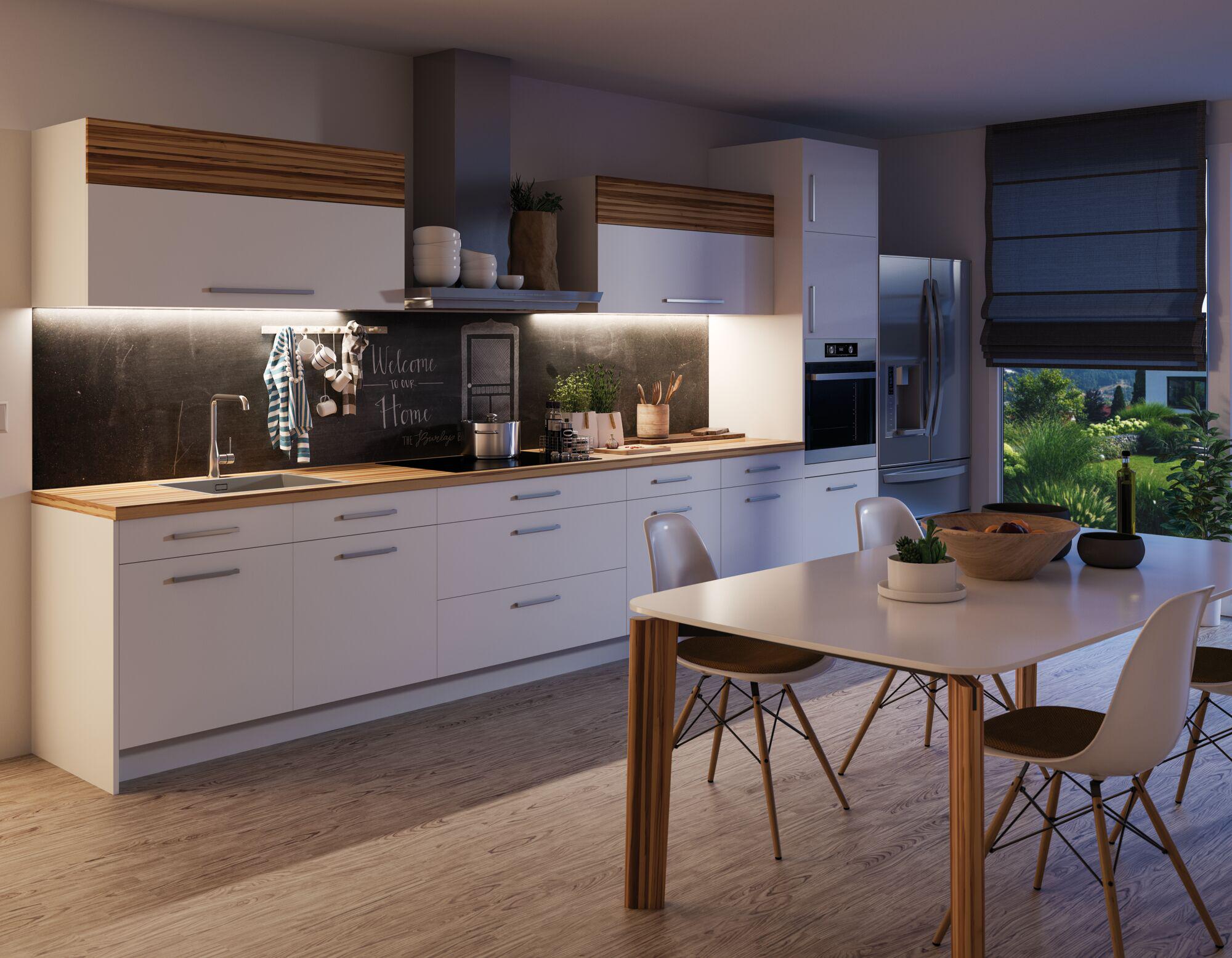 Cuisine moderne blanche avec plan de travail en bois et éclairage LED sous les meubles pour une lumière vive