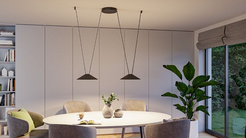 Schwarzes ULine Gurtsystem im Esszimmer Moderne eetkamer met witte ovale tafel, grijze stoelen en zwarte metalen hanglampen