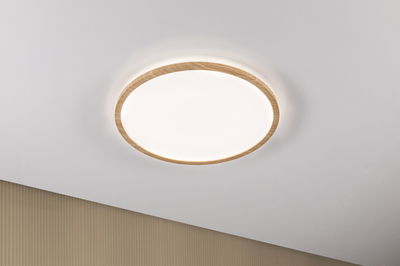 Plafonnier rond avec cadre en bois et diffuseur blanc pour un éclairage moderne