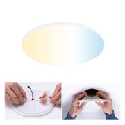 Round LED ceiling light with adjustable color temperature in white, mounted using spring clips.