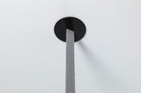 Black round ceiling mount with grey textile cable for modern LED pendant light.