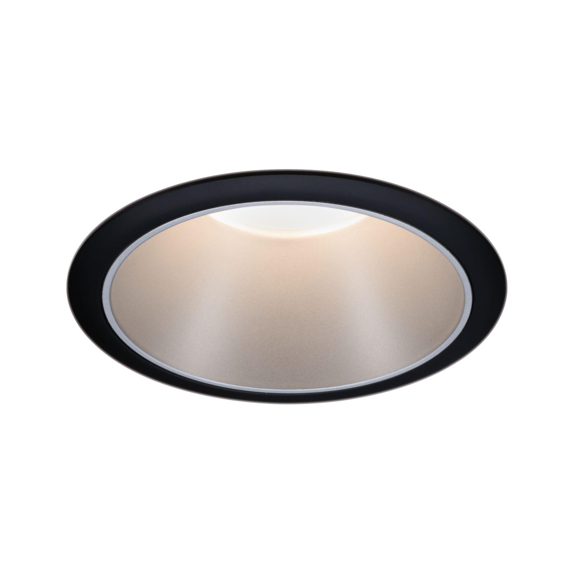 Round LED recessed light with black aluminium frame and warm white light for modern interiors