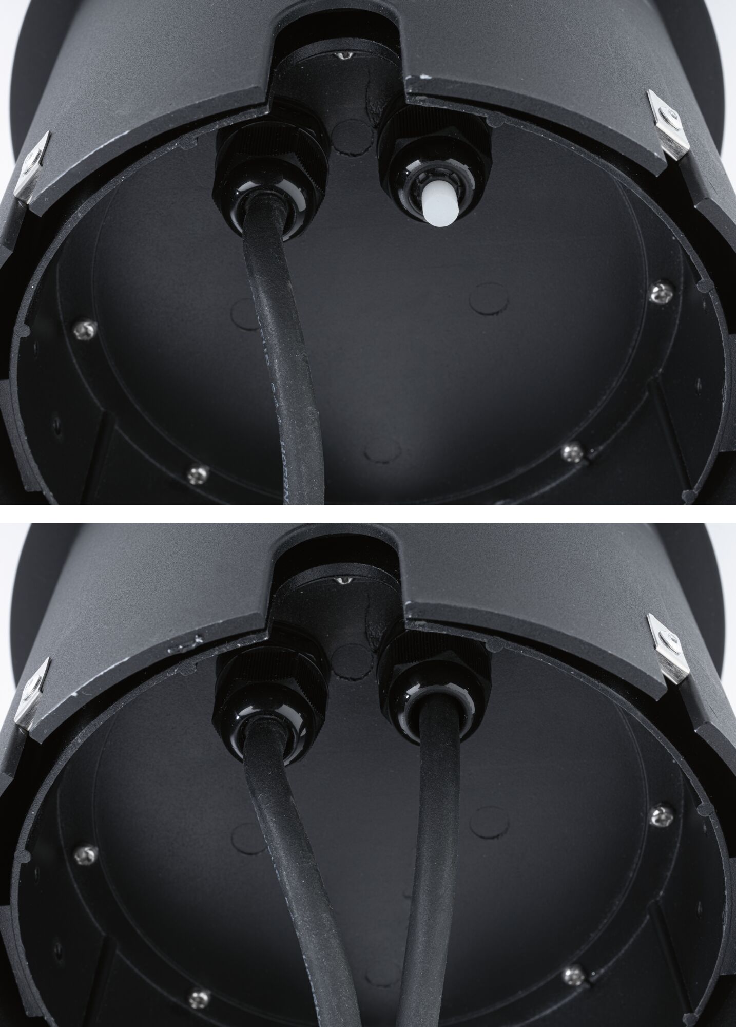 Close-up of black plastic housing with cable glands for LED lighting installation