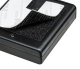 Black plastic case with hook-and-loop fastener and 3M adhesive pad for flexible mounting