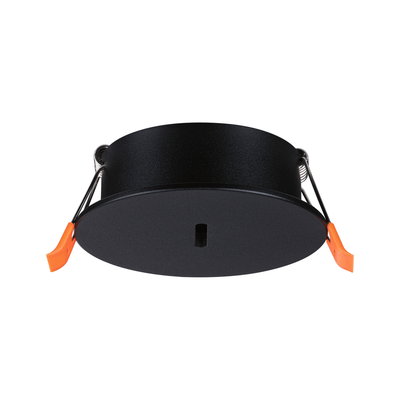 Rund sort metal indbygningsramme med orange clips til LED-spotinstallation