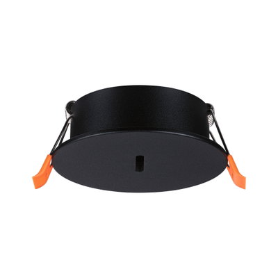 Round black metal recessed frame with orange clips for LED downlights installation