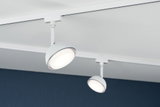 Two white metal LED spotlights on ceiling track system for modern room lighting