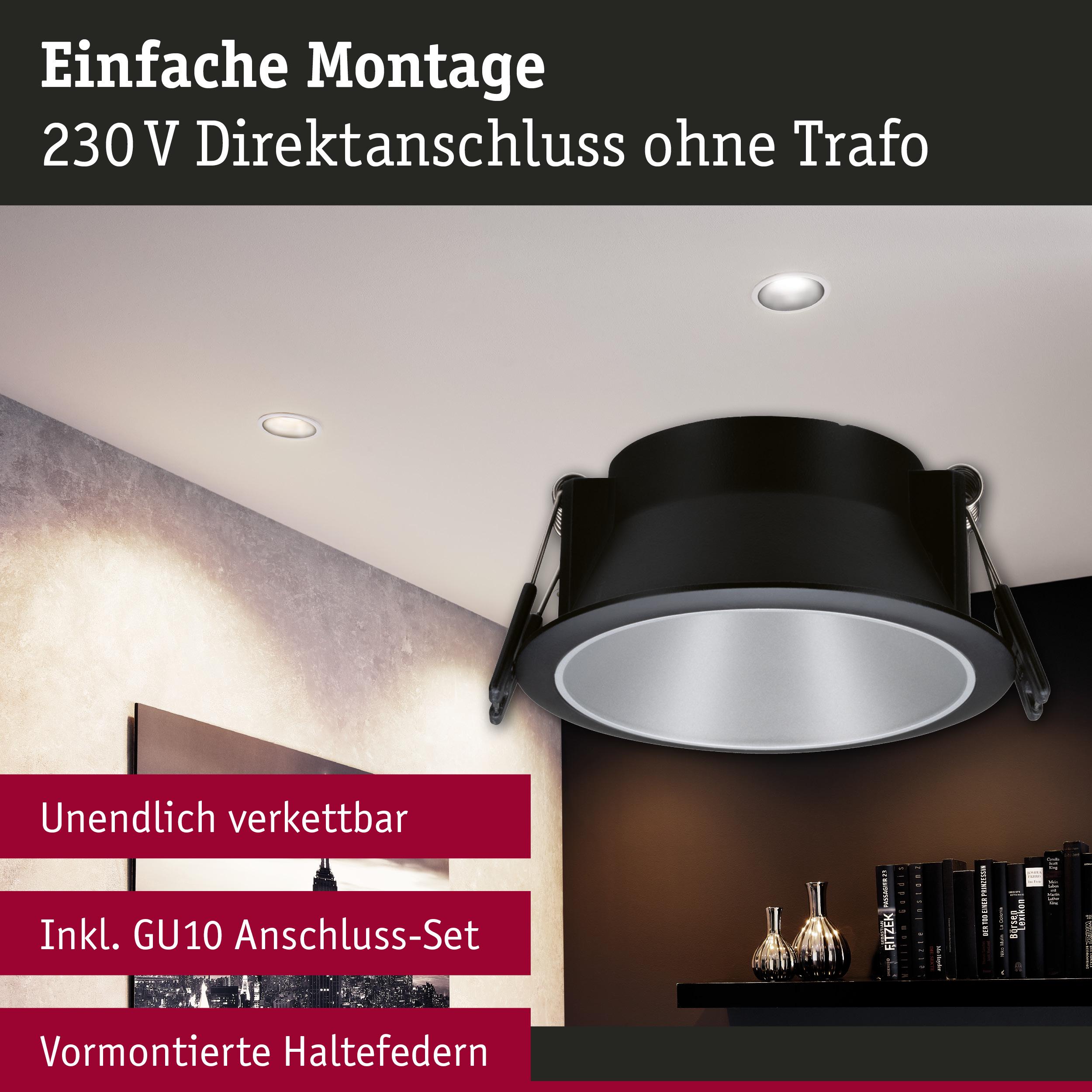 Schwarzer Einbaustrahler mit silbernem Reflektor und vormontierten Haltefedern für 230V Direktanschluss